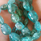 Perle Olive en Apatite verte 6 à 8 mm - à l'unité