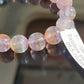 Un bracelet en fluorite violette rainbow AA