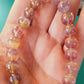 Un bracelet en fluorite violette rainbow AA