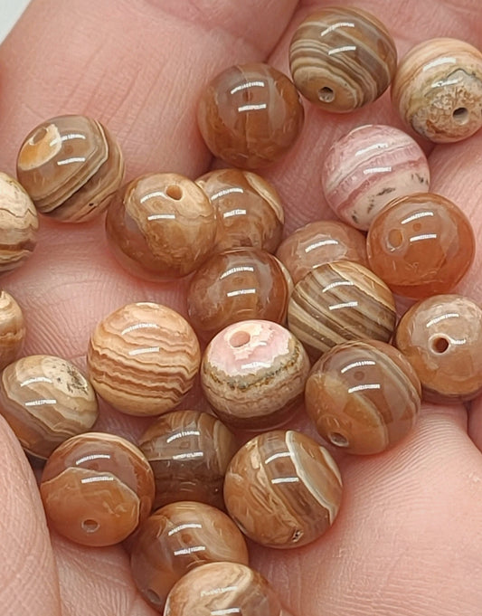 Perle en Rhodocrosite AA  10 mm - à l'unité