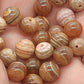Perle en Rhodochrosite naturelle  10 mm - à l'unité