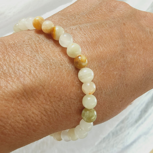 Bracelet en Aragonite du Pérou - perles de 6 mm - Qualité 💎 💎💎